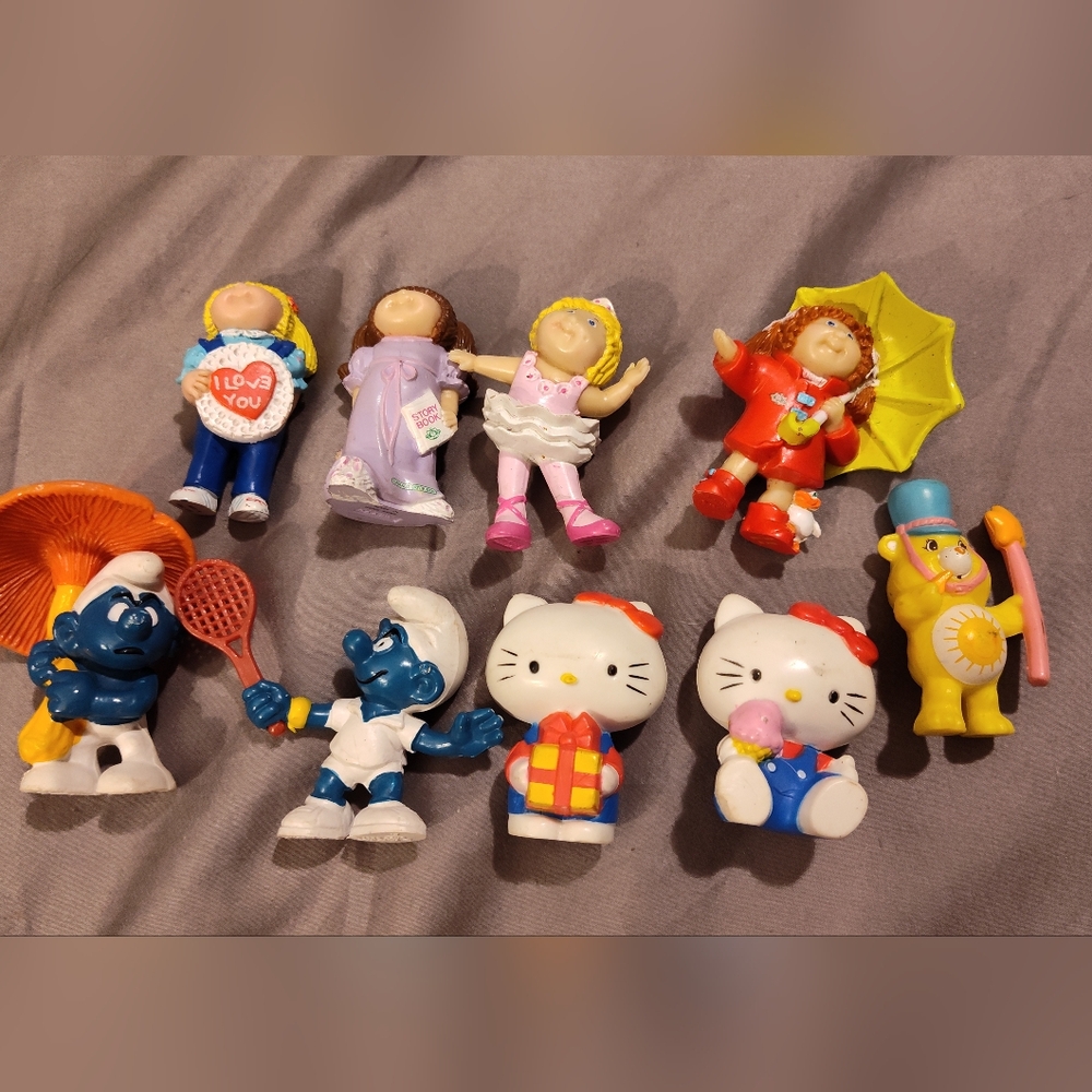 Vintage PVC Bundle Of Figures (9ct) (CPK, Smurfs, Hello Kitty, & Care bear)